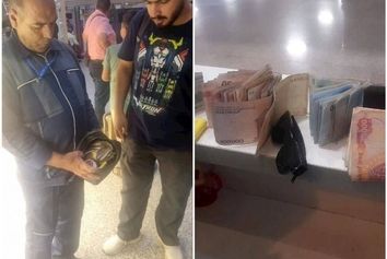 کارگر خدماتی فرودگاه مشهد کیف پول یک میلیاردی را به زائر خارجی بازگرداند
