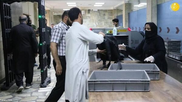 کارکنان زن فرودگاه کابل با حجاب اسلامی به سر کار بازگشتند 